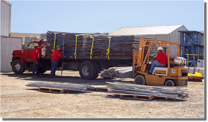 INI workers unloading truck